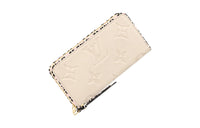 LOUIS VUITTON Zippy Wallet Wild At Heart Cream