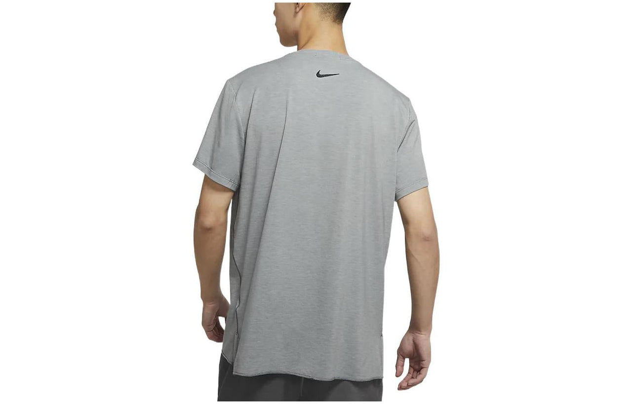 Men's Nike SS22 Yoga Dri-FIT Moisture Conduction Quick Dry Solid Color Round Neck Short Sleeve Gray T-Shirt DM7826-077