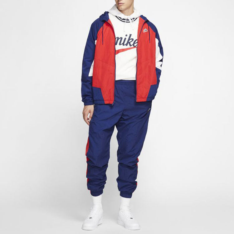 Men's Nike Logo Embroidered Contrasting Colors Woven Bundle Feet Sports Pants/Trousers/Joggers Blue AR2366-492