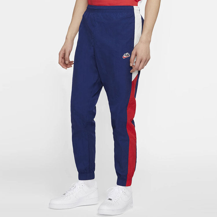 Men's Nike Logo Embroidered Contrasting Colors Woven Bundle Feet Sports Pants/Trousers/Joggers Blue AR2366-492