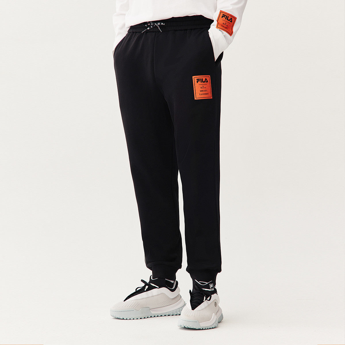 FILA x MIHARA Crossover Casual Bundle Feet Sports Knit Long Pants Black F71M118604F-BK