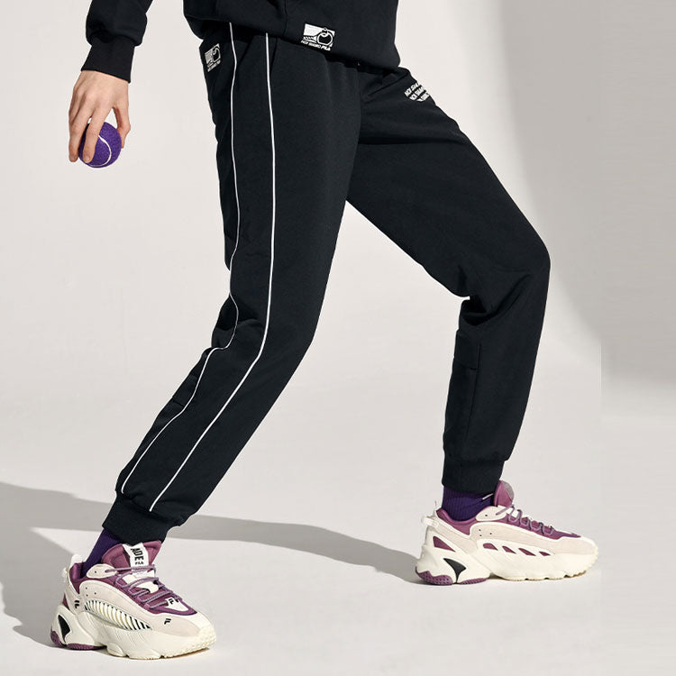 FILA FUSION Alphabet Printing Sports Woven Bundle Feet Long Pants Black T11W111801F-BK
