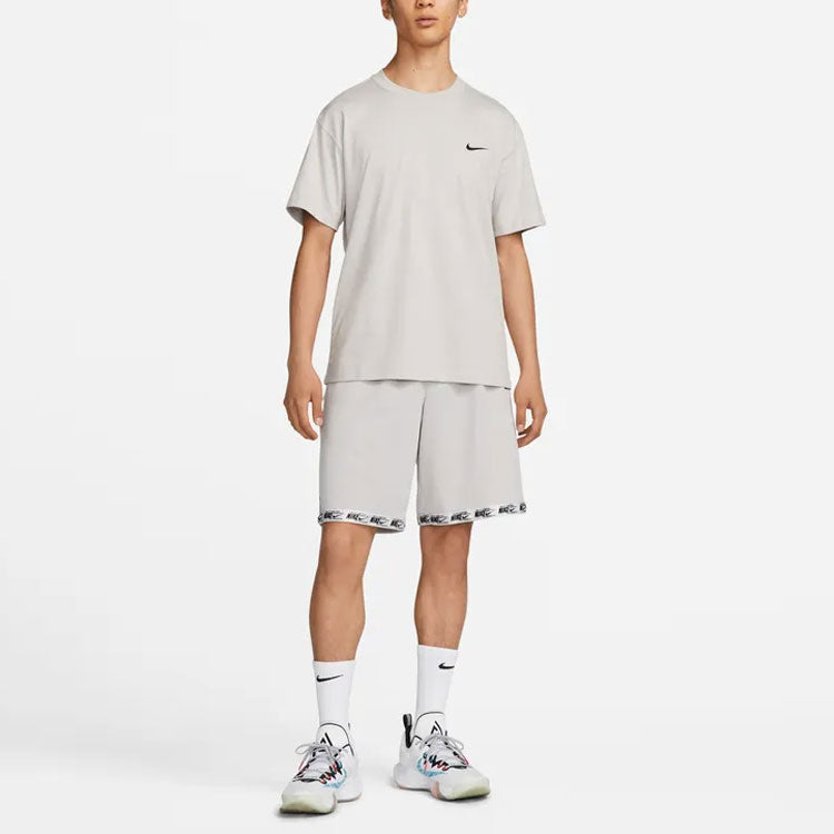 Men's Nike Solid Color Ribbed Collar Back Printing Short Sleeve Gray T-Shirt DZ3028-012