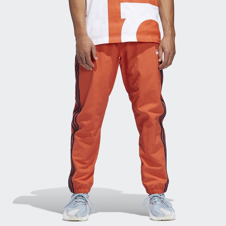 adidas originals Woven Three Stripe Warm up Pants DV3141