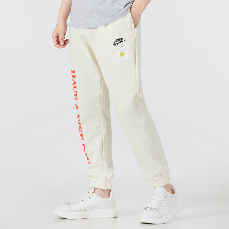 Men's Nike Alphabet Printing Daisy Sports Pants/Trousers/Joggers Creamy White DM5015-113