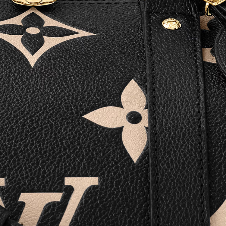 LOUIS VUITTON Keepall Bandouliere 45 Monogram Empreinte Leather 'Black Beige' M46670