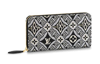 LOUIS VUITTON Zippy Clutches