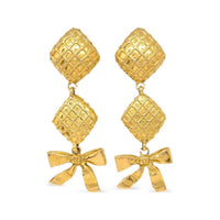 CHANEL 1990 2000 Waffle Texture Bow Dangle Clip on Earrings