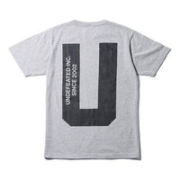 Men's UNDEFEATED X CHAMPION Crossover Back Large U Logo Short Sleeve Gray C8-P370-GRAY