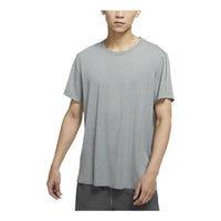 Men's Nike SS22 Yoga Dri-FIT Moisture Conduction Quick Dry Solid Color Round Neck Short Sleeve Gray T-Shirt DM7826-077